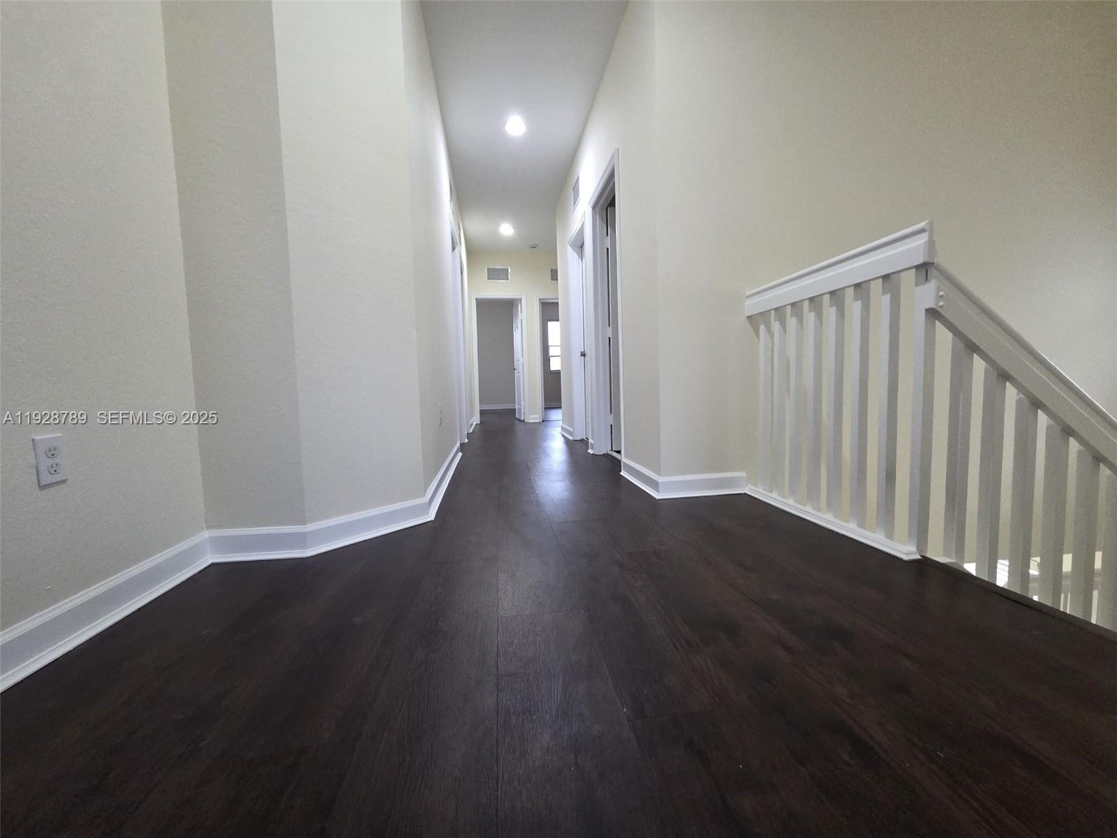 8841 West 34th Court Hialeah, FL 33018 - Photo 31 of 48 a view of hallway with wooden floor