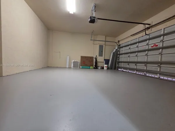 a view of hallway with wooden floor