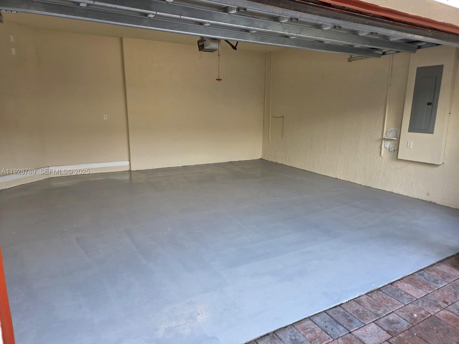 8841 West 34th Court Hialeah, FL 33018 - Photo 33 of 48 a view of a room with racks on the wall