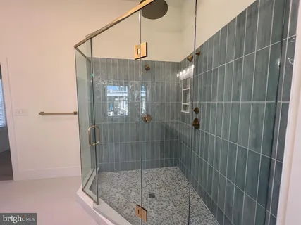 a white bath tub sitting next to a window