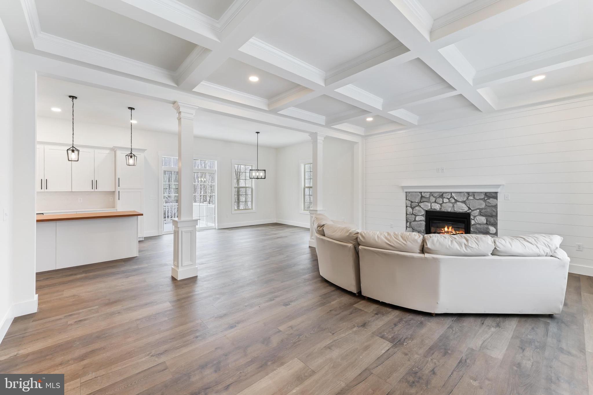 183 Ellicott Road Avondale, PA 19311 - Photo 87 of 92 a living room with furniture and a fireplace