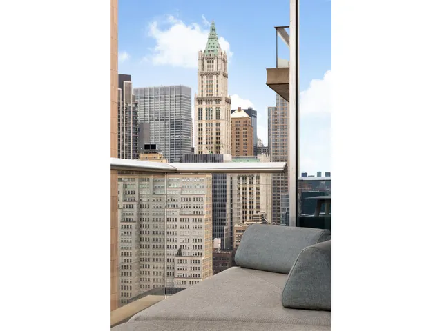 a view of a living room with a large window