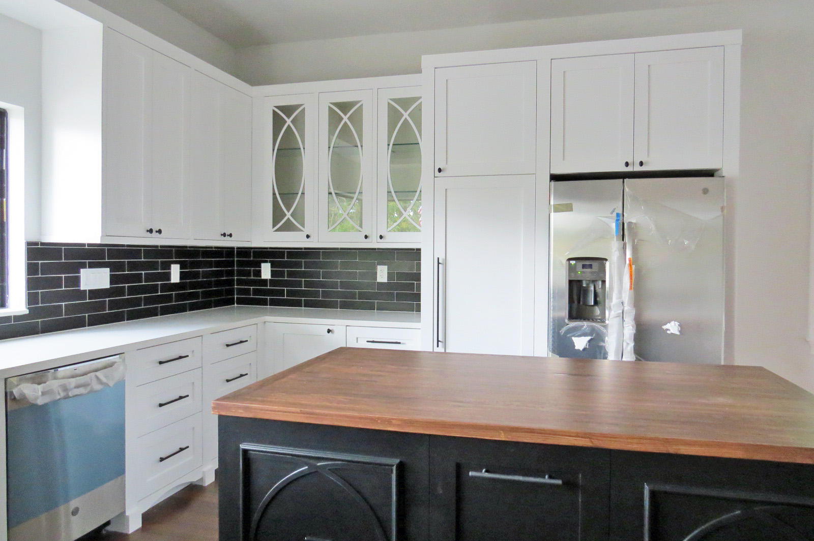 7 Cindy Place Key Largo, FL 33037 - Photo 11 of 31 a kitchen with stainless steel appliances granite countertop a sink a stove and cabinets
