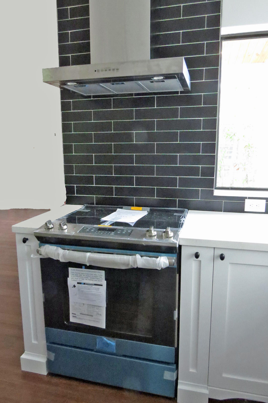 7 Cindy Place Key Largo, FL 33037 - Photo 17 of 31 a stove top oven sitting inside of a kitchen