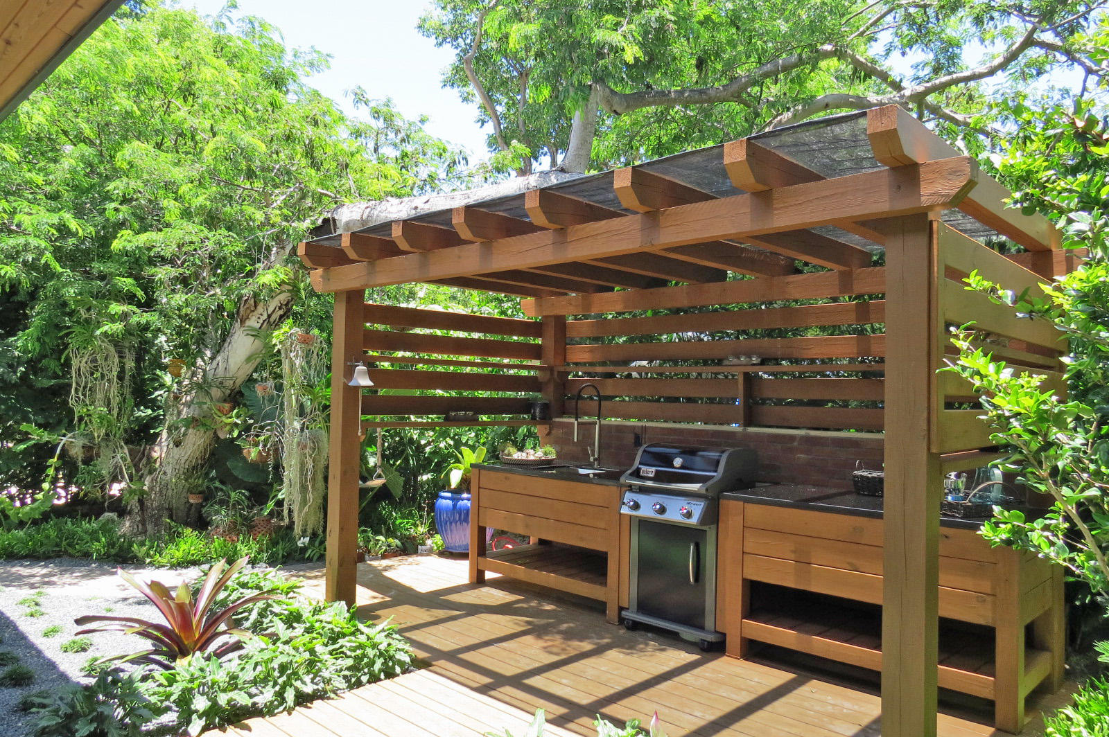 7 Cindy Place Key Largo, FL 33037 - Photo 27 of 31 a view of a patio with table and chairs under an umbrella