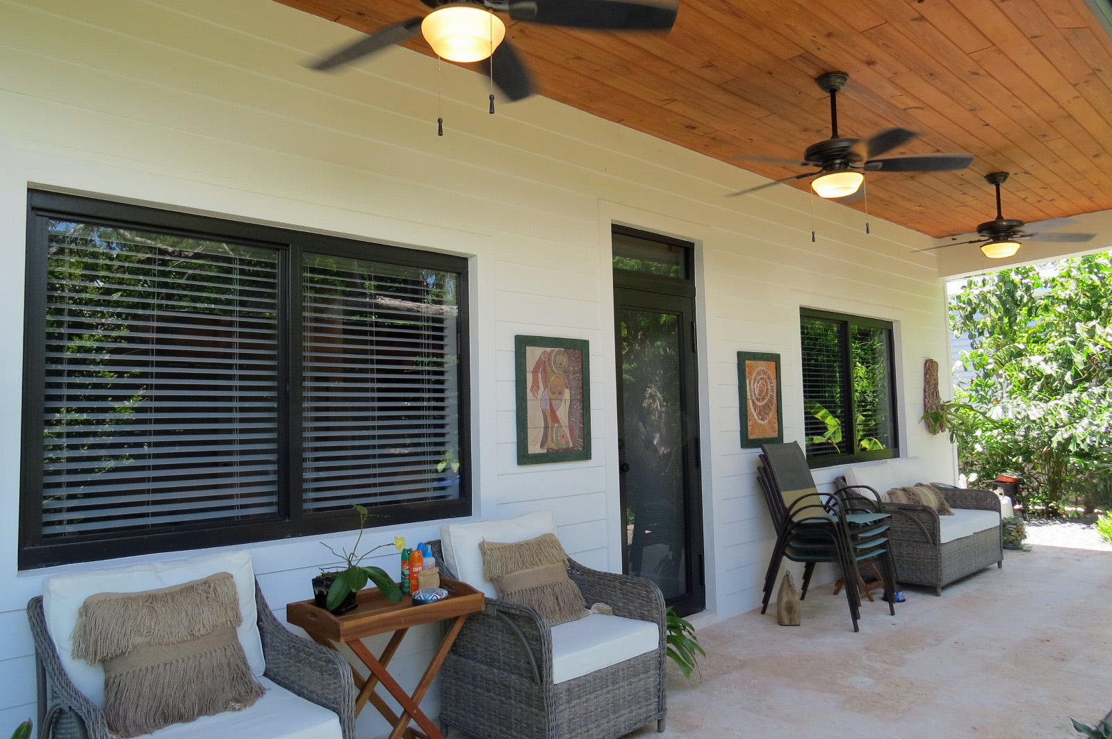 7 Cindy Place Key Largo, FL 33037 - Photo 3 of 31 a balcony with furniture and a potted plant