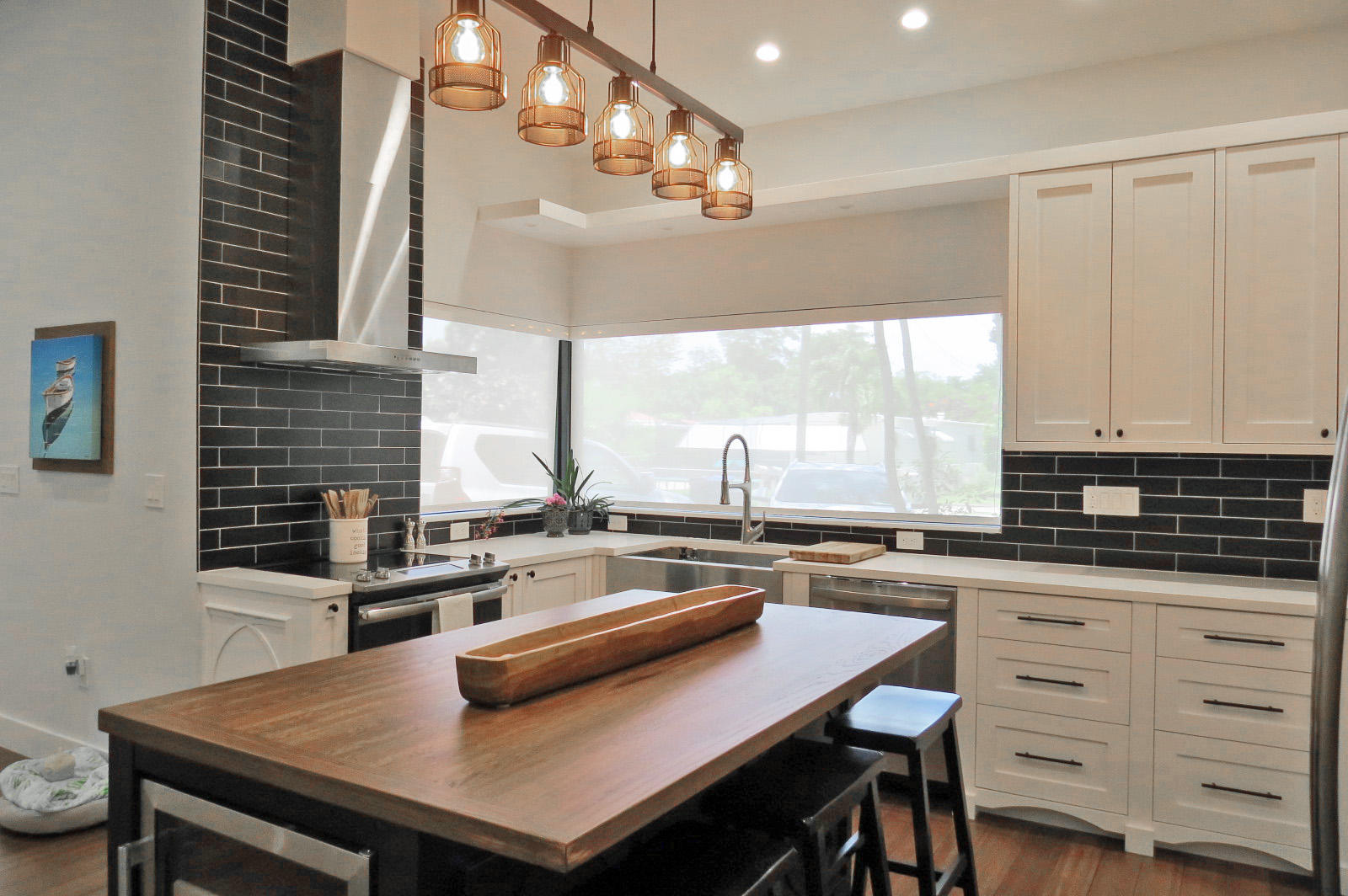 7 Cindy Place Key Largo, FL 33037 - Photo 8 of 31 a kitchen with a sink a stove a table and chairs