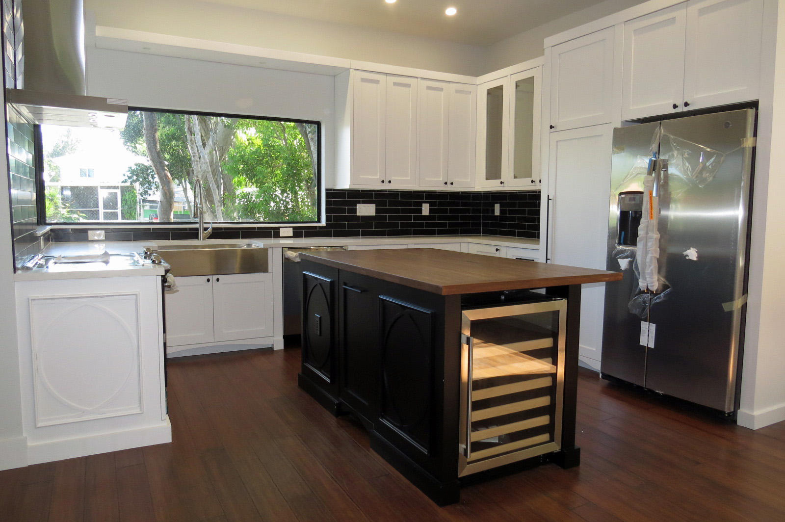 7 Cindy Place Key Largo, FL 33037 - Photo 10 of 31 a kitchen with a stove sink and refrigerator