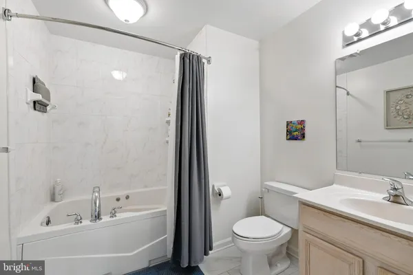 a bedroom with a bed and a closet