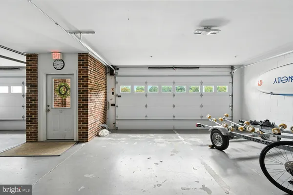 a front view of a house with parking space