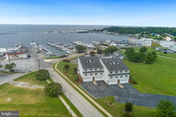 a picture of a bench in front of a window