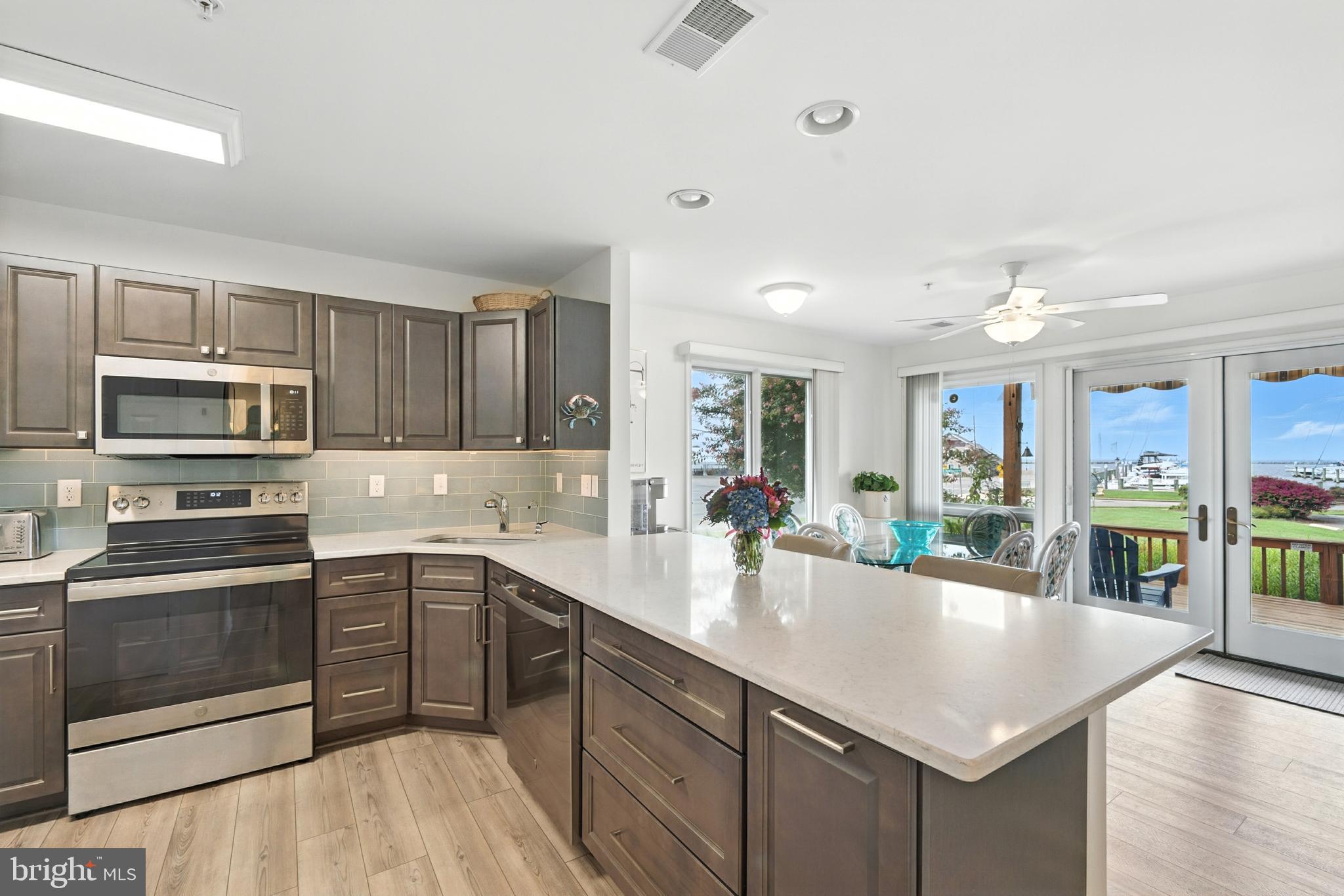 21090 West Sharp Street, Unit 112 Rock Hall, MD 21661 - Photo 6 of 28 Upgraded kitchen with granite countertops