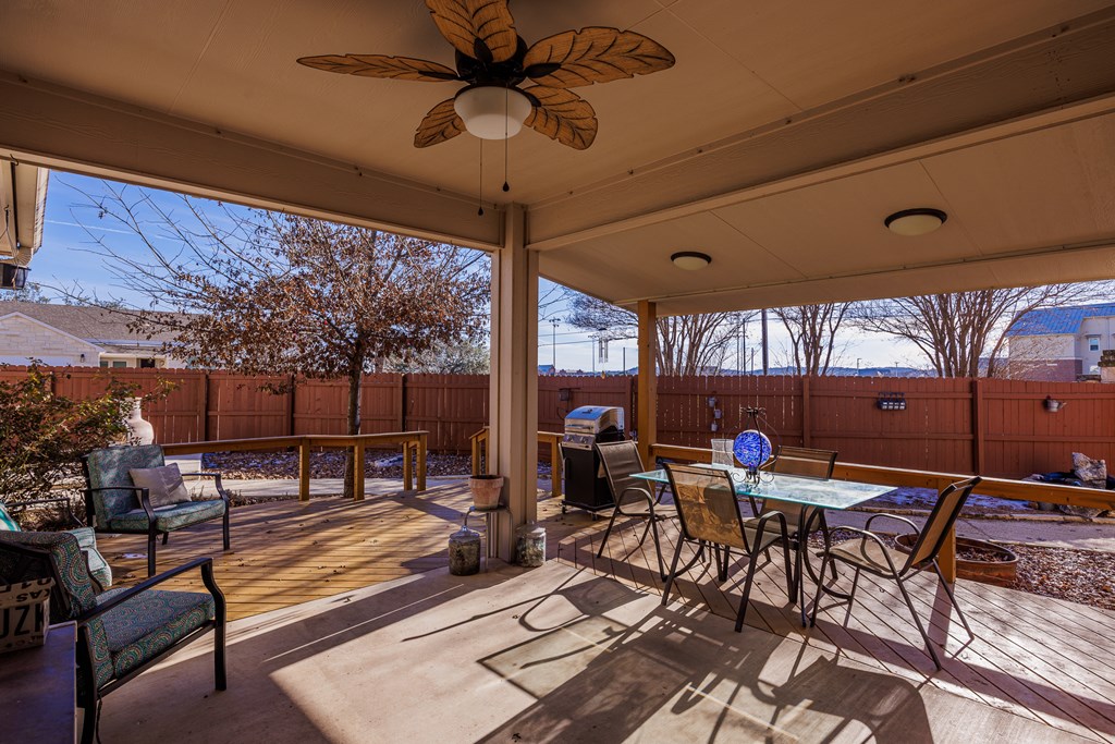 1922 Weston Loop Kerrville, TX 78028 - Photo 3 of 22 a outdoor space with lots of tables and chairs