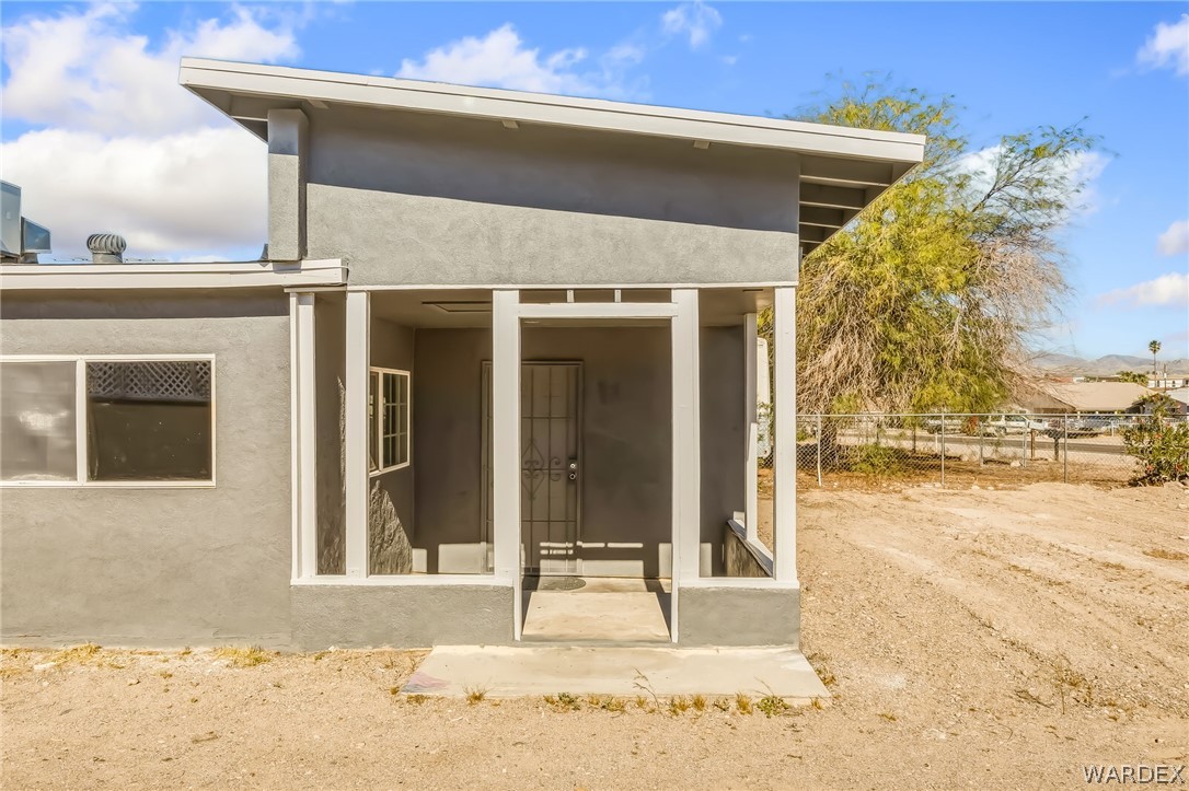 1628 Ramar Road Bullhead City, AZ 86442 - Photo 14 of 64 Front Entrance with covered porch.