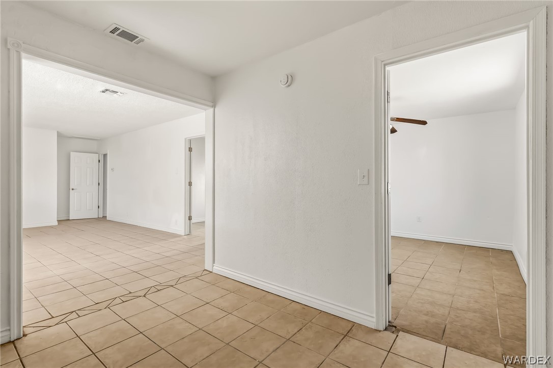 1628 Ramar Road Bullhead City, AZ 86442 - Photo 38 of 64 The interior features neutral-toned floor tiles throughout