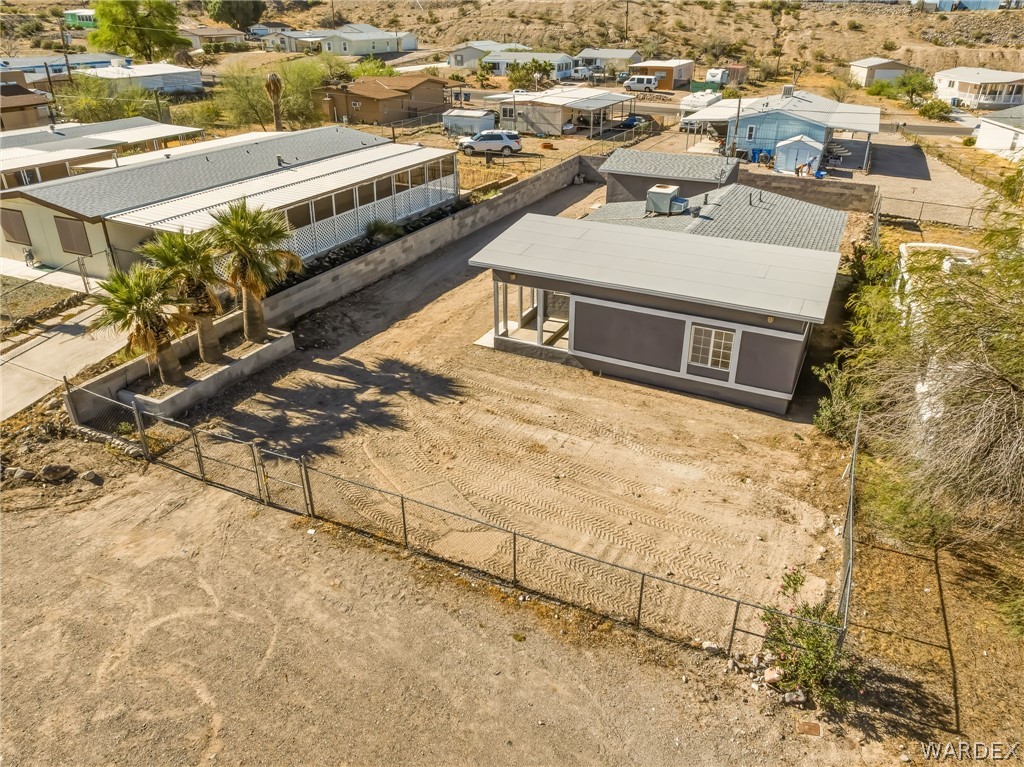 1628 Ramar Road Bullhead City, AZ 86442 - Photo 6 of 64 The property features a fenced lot, that is cleared and ready for your personal touches.