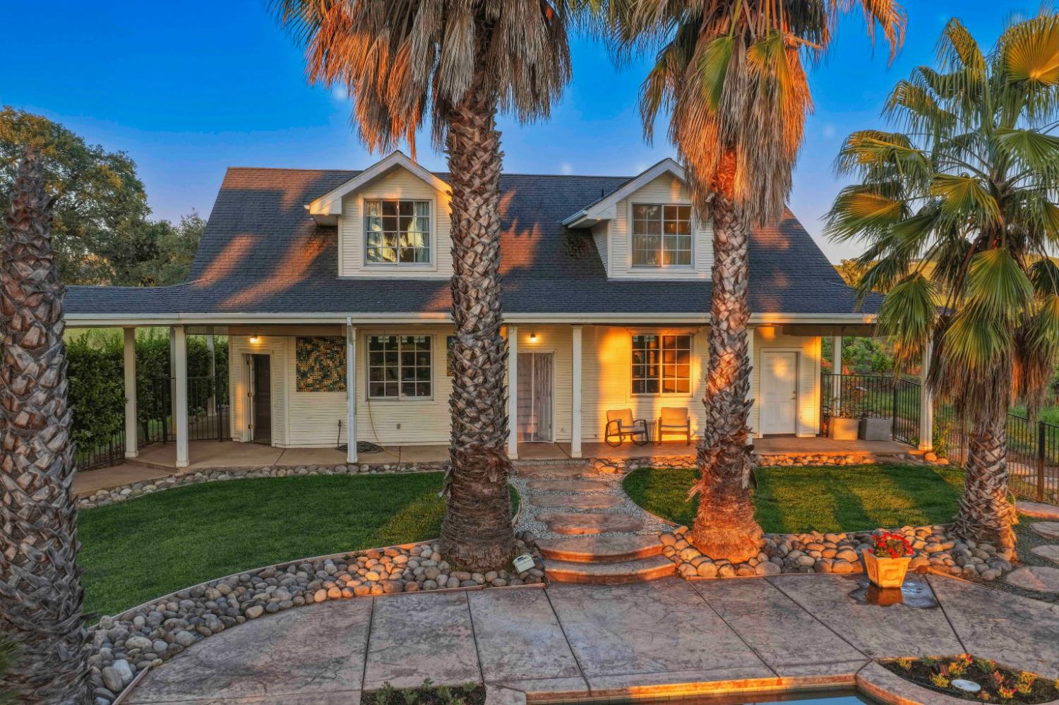 10120 Shenandoah Road Plymouth, CA 95669 - Photo 7 of 86 front view of a house with a garden