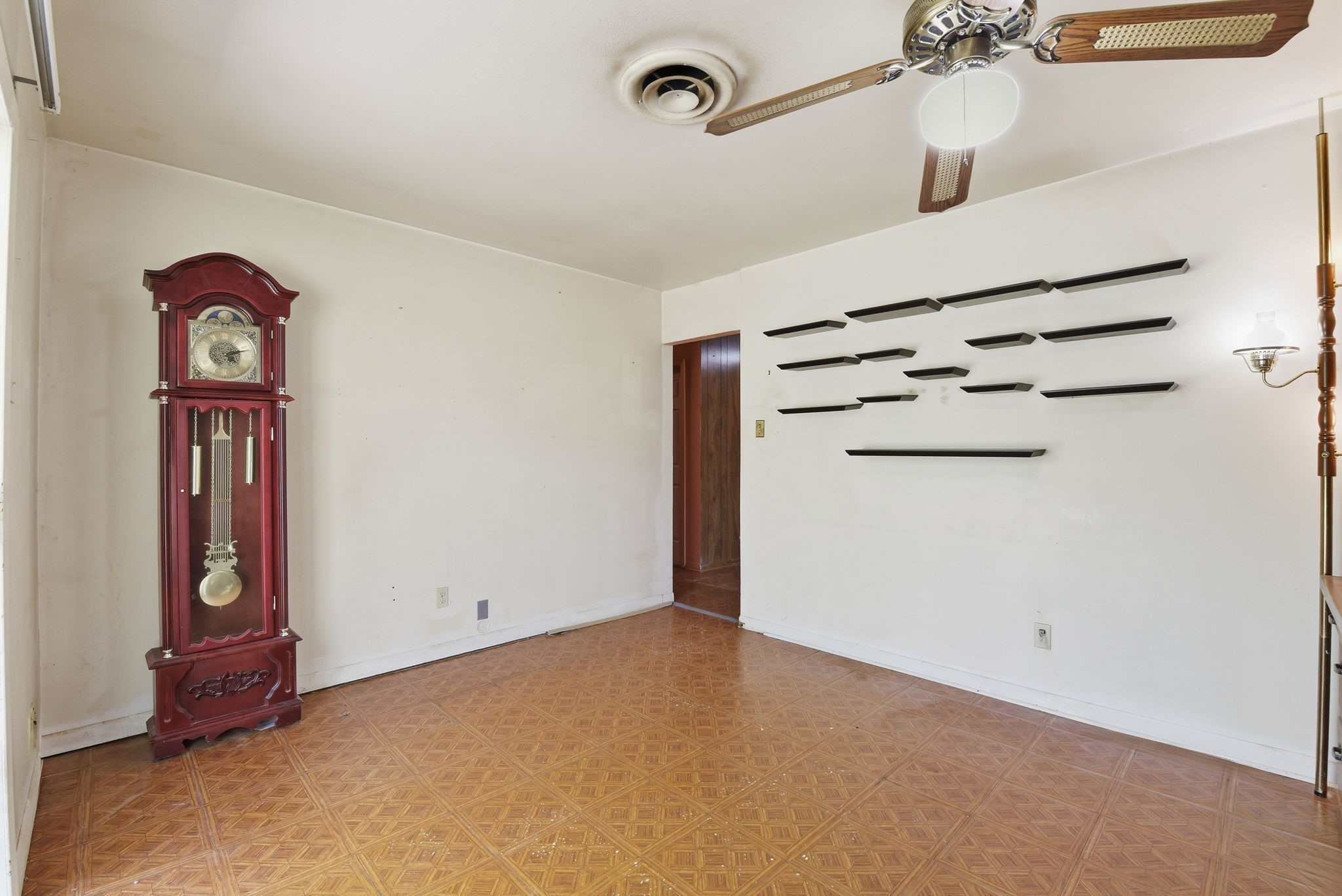 7555 Fm 1725 Road Coldspring, TX 77331 - Photo 11 of 31 an empty room with windows and closet