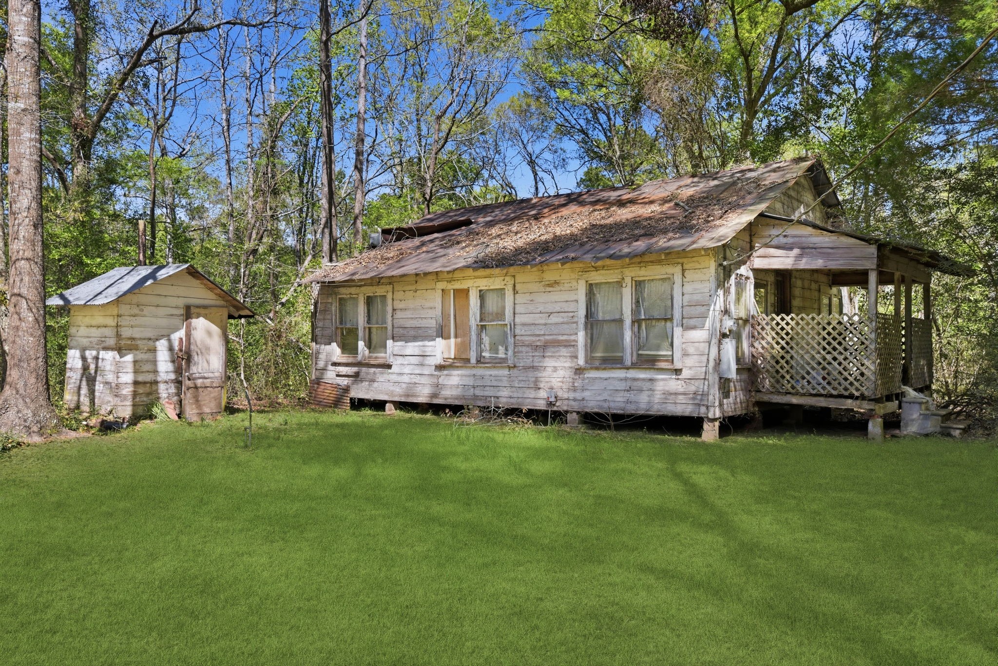 7555 Fm 1725 Road Coldspring, TX 77331 - Photo 24 of 31 a view of a house with a yard