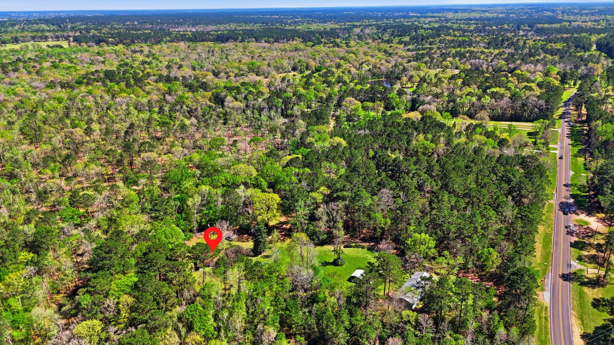 7555 Fm 1725 Road Coldspring, TX 77331 - Photo 29 of 31 a view of a large yard