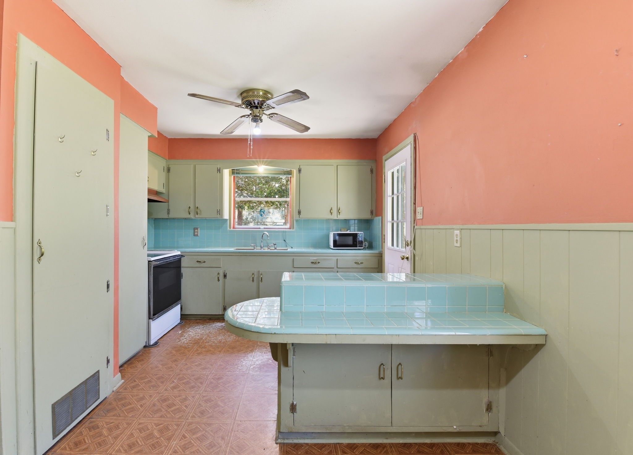 7555 Fm 1725 Road Coldspring, TX 77331 - Photo 6 of 31 a kitchen with a table chairs sink and cabinets