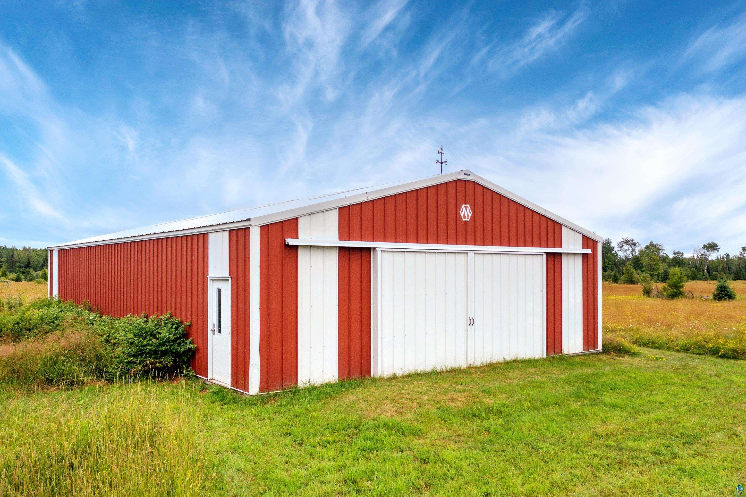 5988 Ryan Road Duluth, MN 55804 - Photo 14 of 50 View of outbuilding featuring a yard