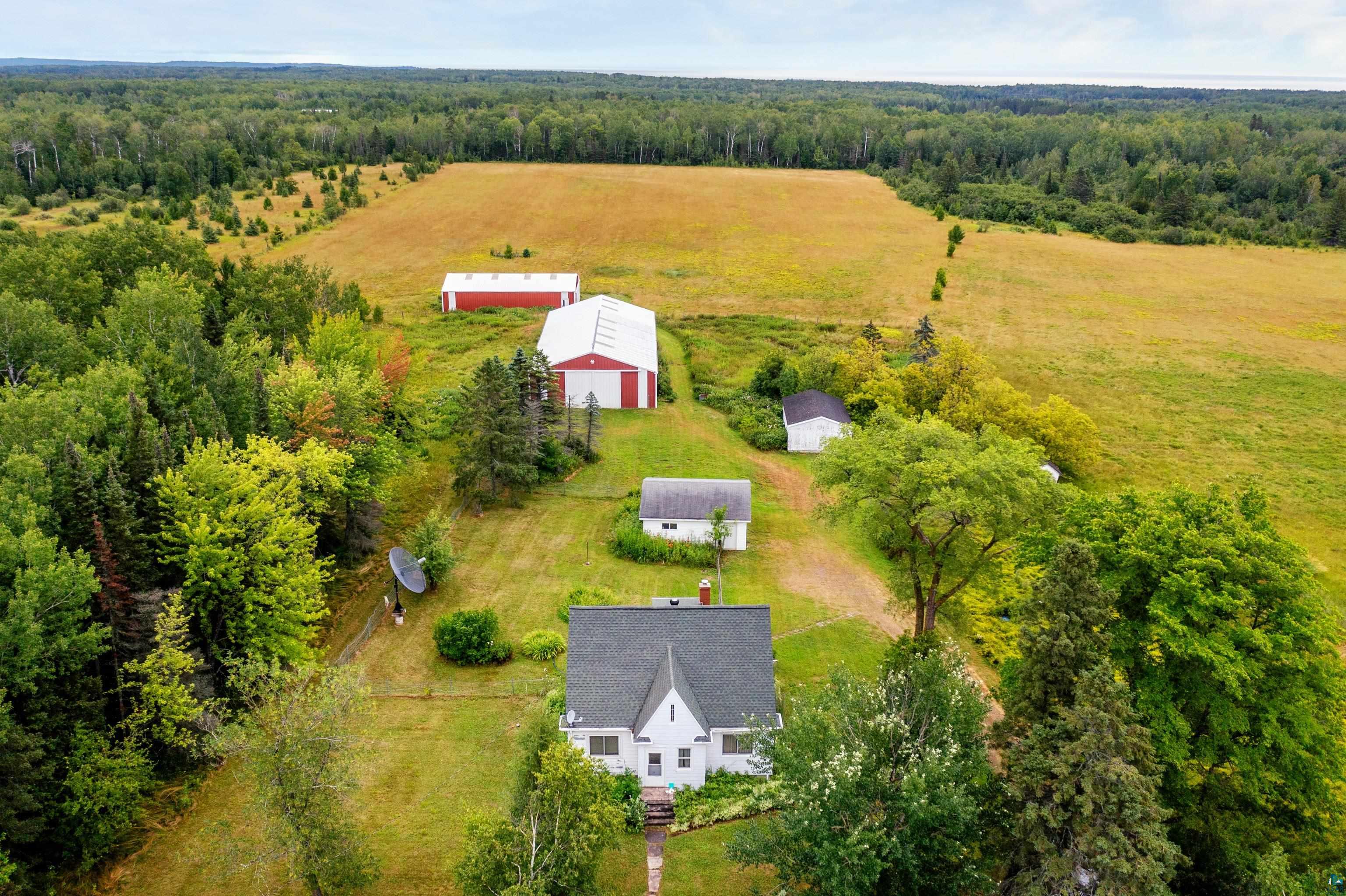 5988 Ryan Road Duluth, MN 55804 - Photo 3 of 50 Drone / aerial view with a rural view
