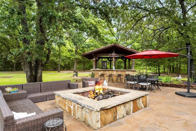a view of swimming pool with a patio