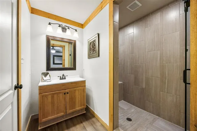 a bedroom with bed and a couch