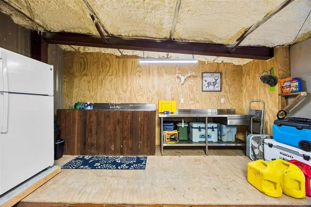 a living room with a couch and a table