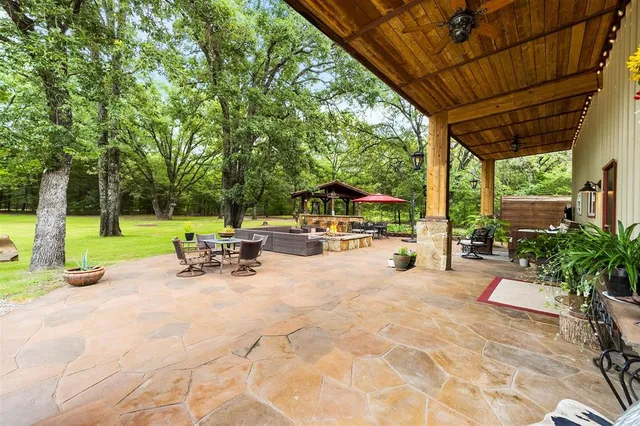 a view of a park with sitting area