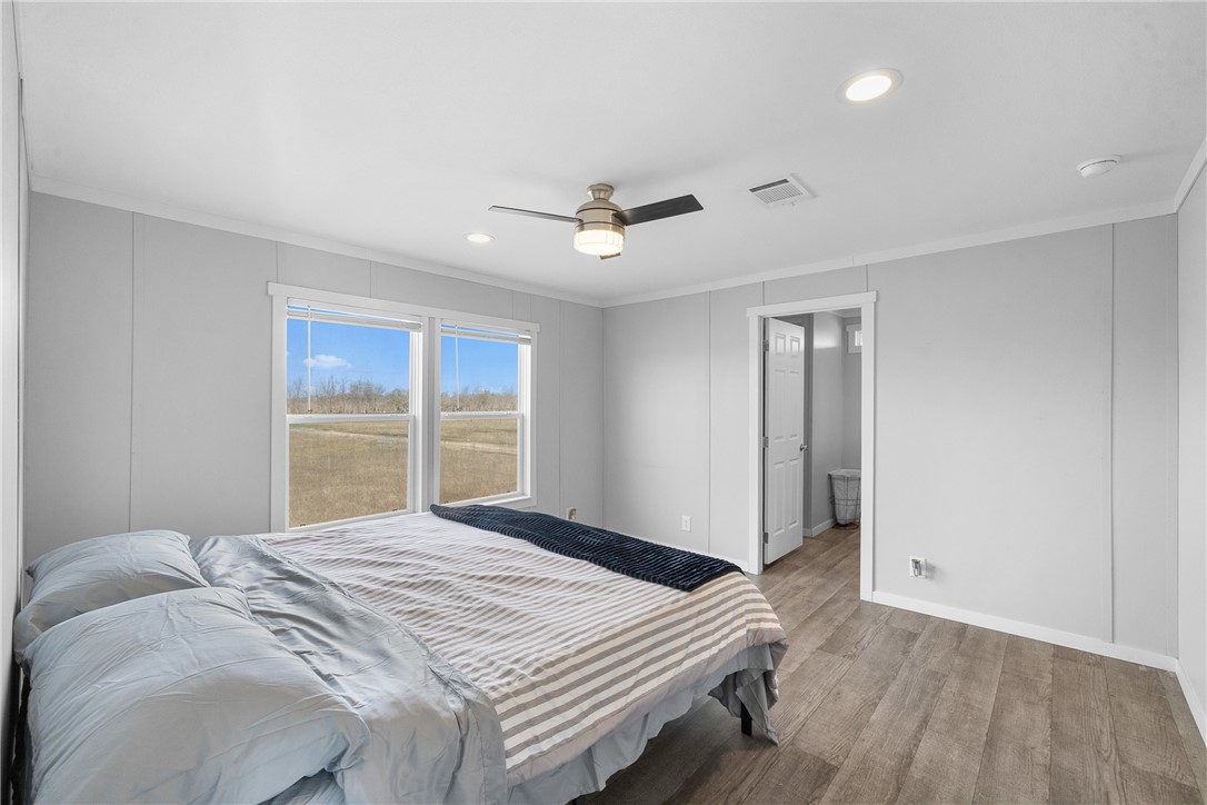 5236 County Road 219 Anderson, TX 77830 - Photo 14 of 35 a bedroom with a bed and a window