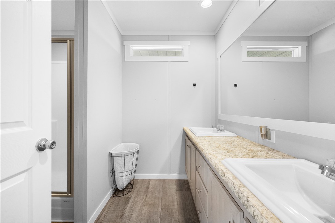 5236 County Road 219 Anderson, TX 77830 - Photo 15 of 35 a bathroom with a granite countertop sink a toilet and a mirror