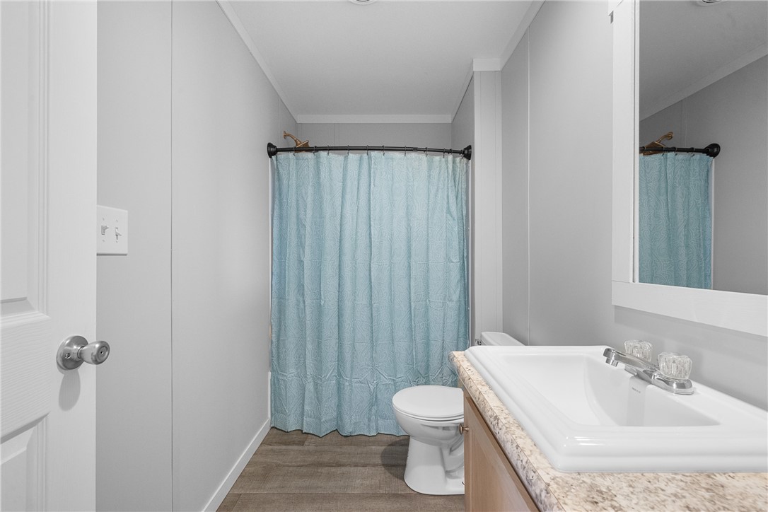 5236 County Road 219 Anderson, TX 77830 - Photo 19 of 35 a bathroom with a sink toilet and shower
