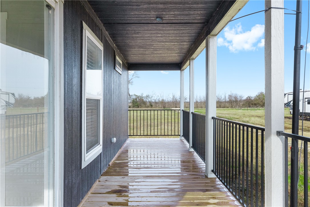 5236 County Road 219 Anderson, TX 77830 - Photo 21 of 35 a view of a balcony with wooden floor