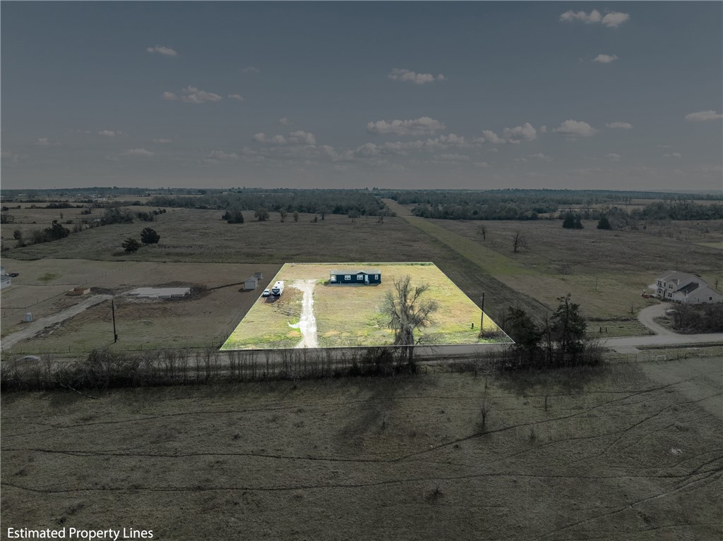 5236 County Road 219 Anderson, TX 77830 - Photo 34 of 35 a view of a swimming pool with an ocean view