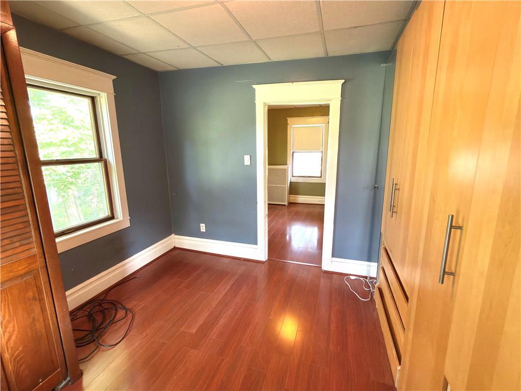 4550 Vera Cruz Road Center Valley, PA 18034 - Photo 39 of 43 Rich wood flooring anchors this versatile bedroom space framed by classic trim work.