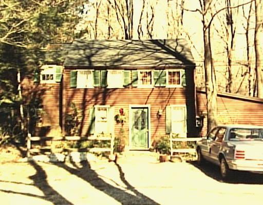 48 Sharp Hill Road, Unit 1 Wilton, CT 06897 - Photo 1 of 1 a view of a swimming pool