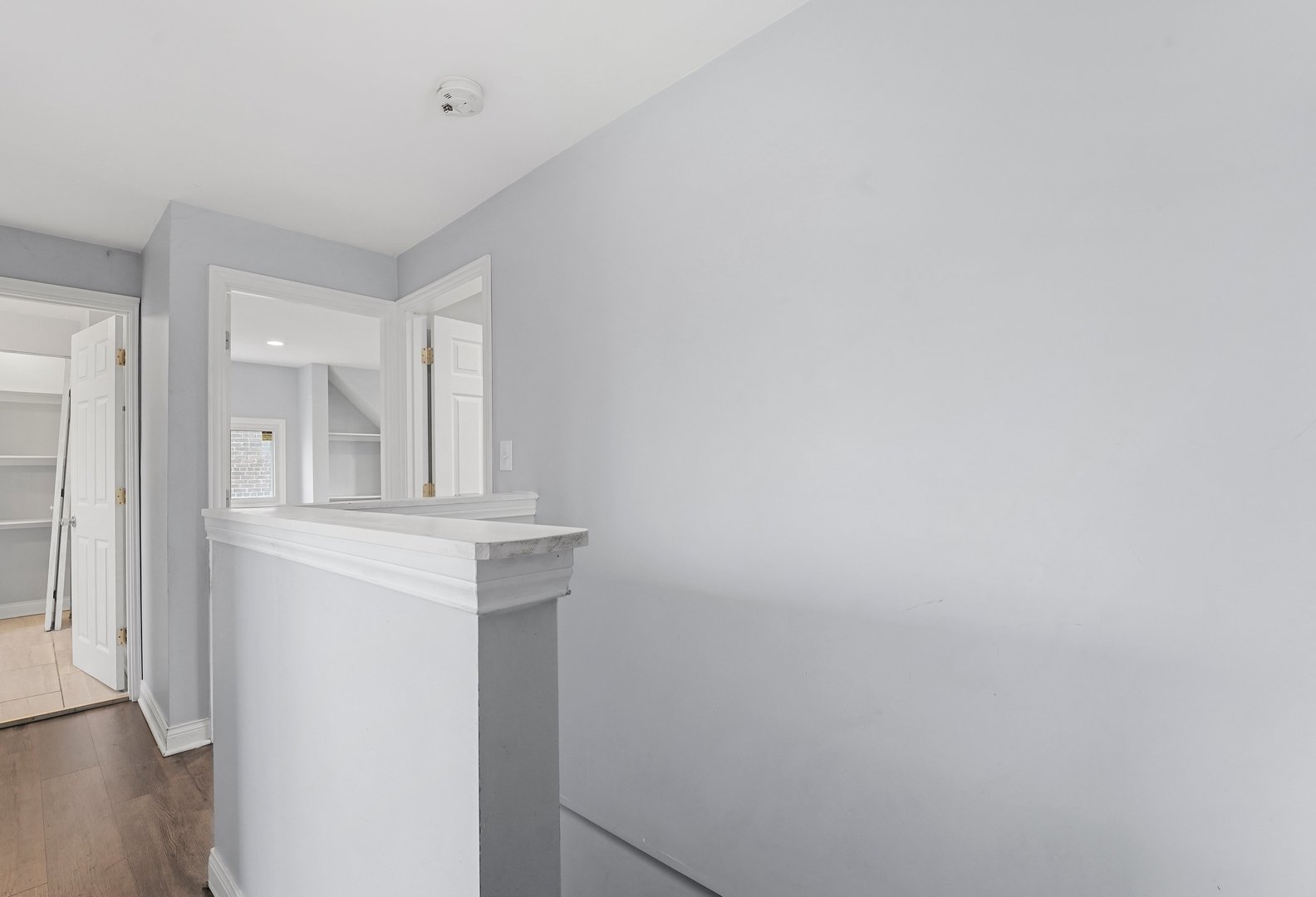 10233 South Calhoun Avenue Chicago, IL 60617 - Photo 16 of 22 a view of a hallway