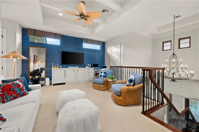 a spacious bedroom with a bed and a large window