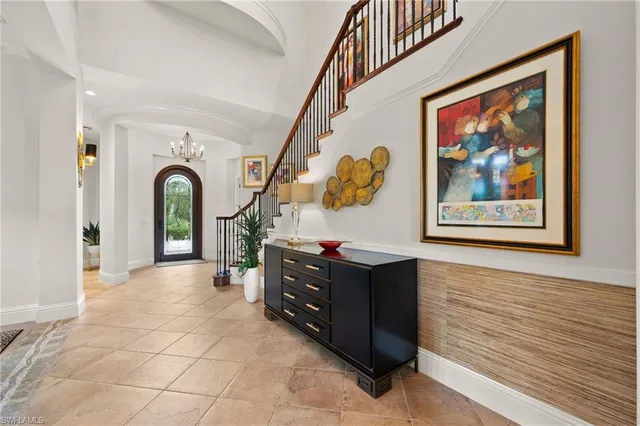 a view of a hallway with paintings on the wall