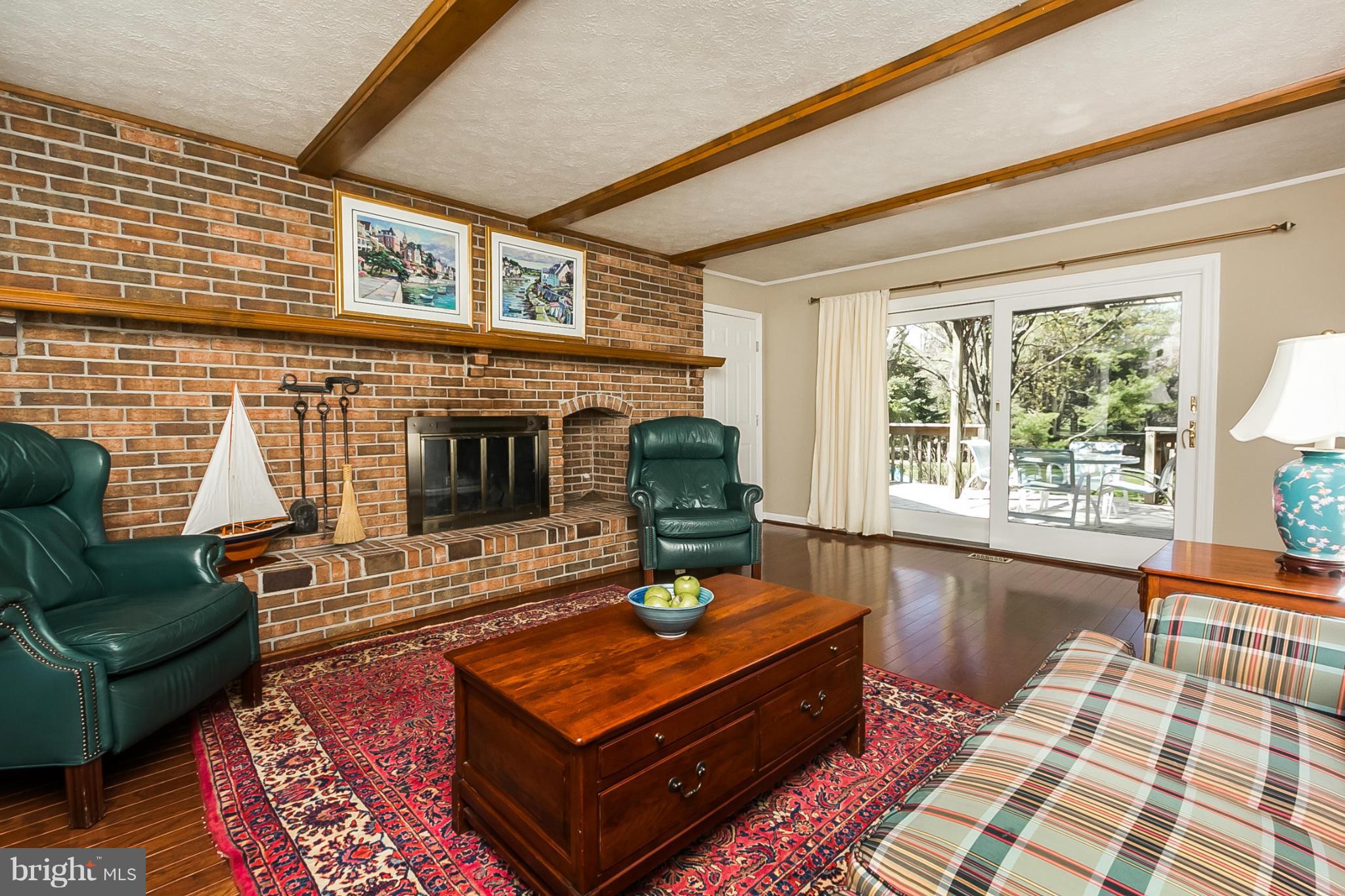 14106 Manor Road Phoenix, MD 21131 - Photo 11 of 30 a living room with furniture and a fireplace