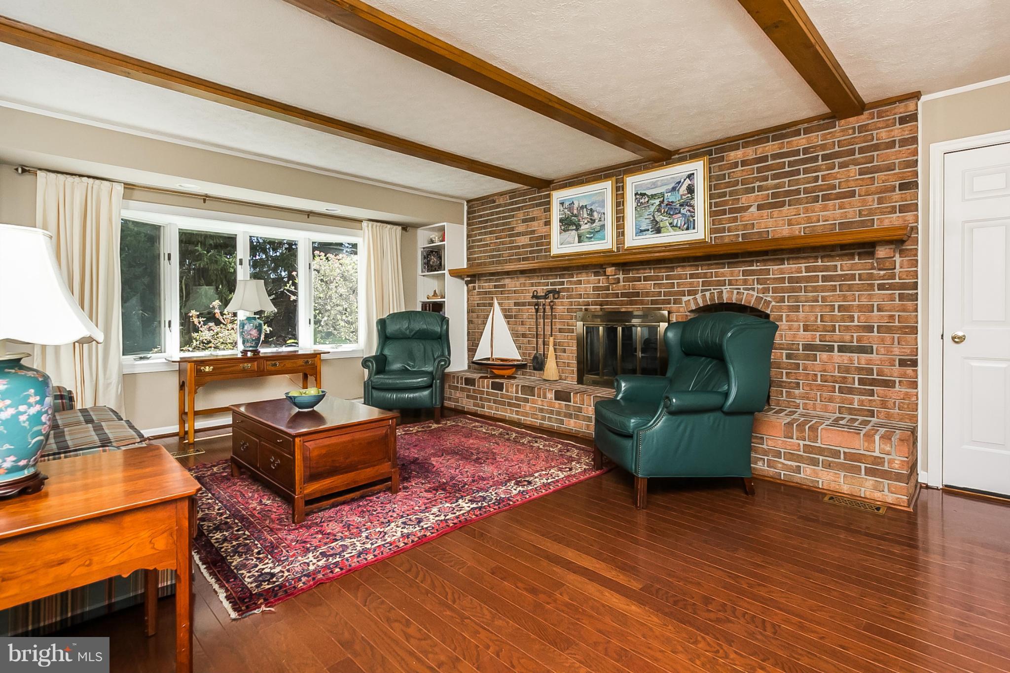 14106 Manor Road Phoenix, MD 21131 - Photo 12 of 30 a living room with furniture and a fireplace
