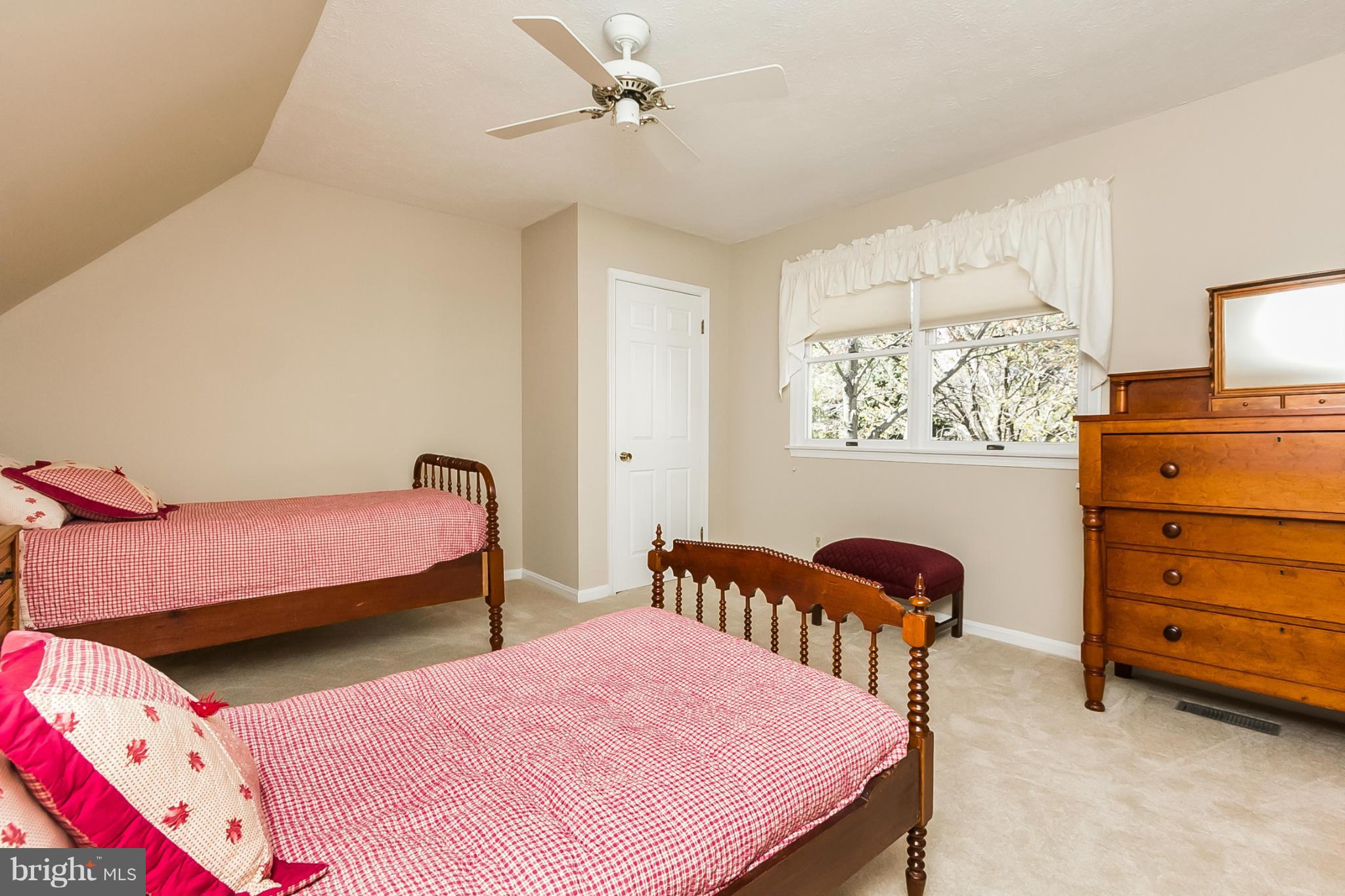 14106 Manor Road Phoenix, MD 21131 - Photo 19 of 30 a bedroom with a bed and a dresser