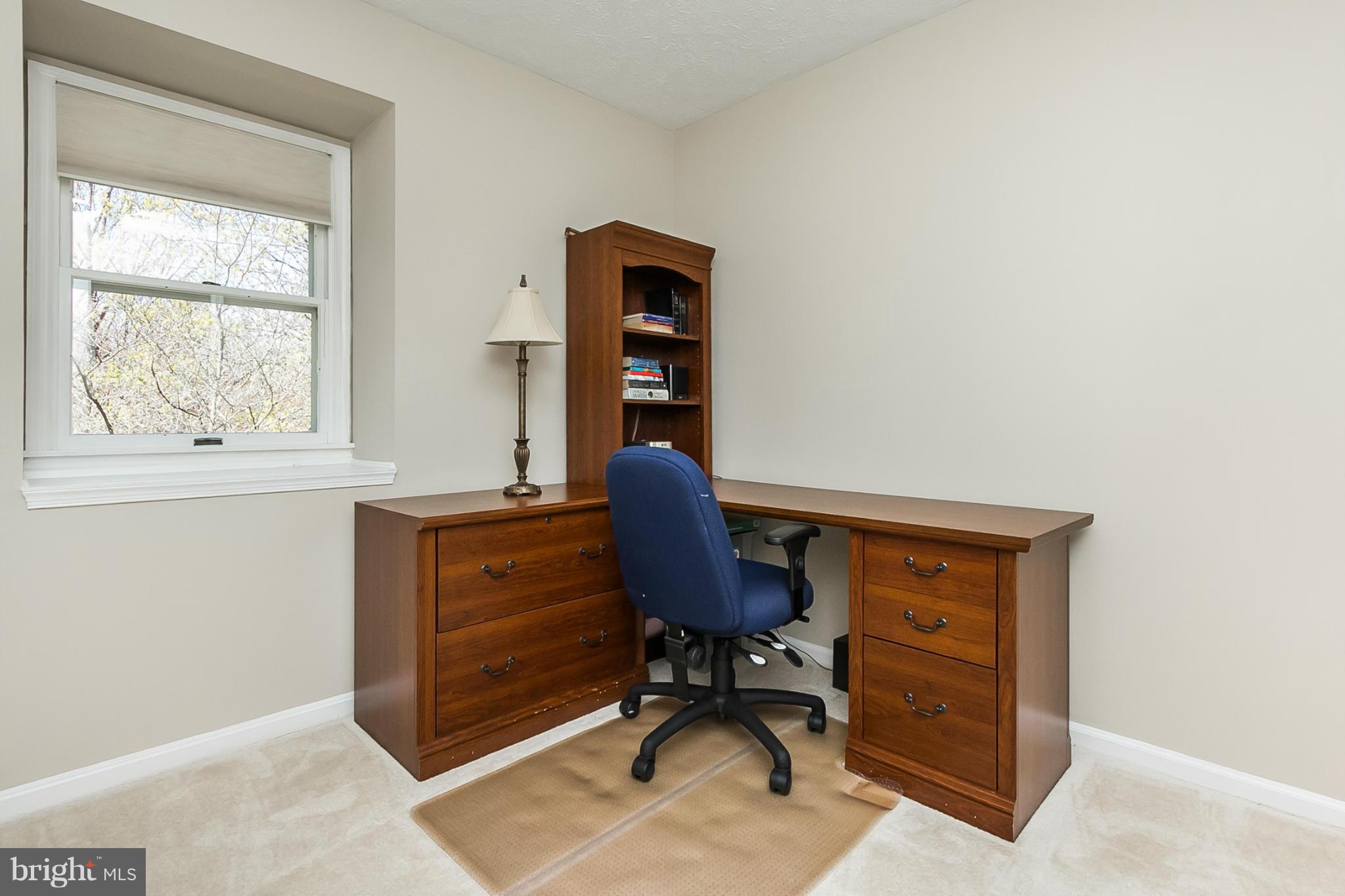 14106 Manor Road Phoenix, MD 21131 - Photo 21 of 30 a workspace with furniture and a window