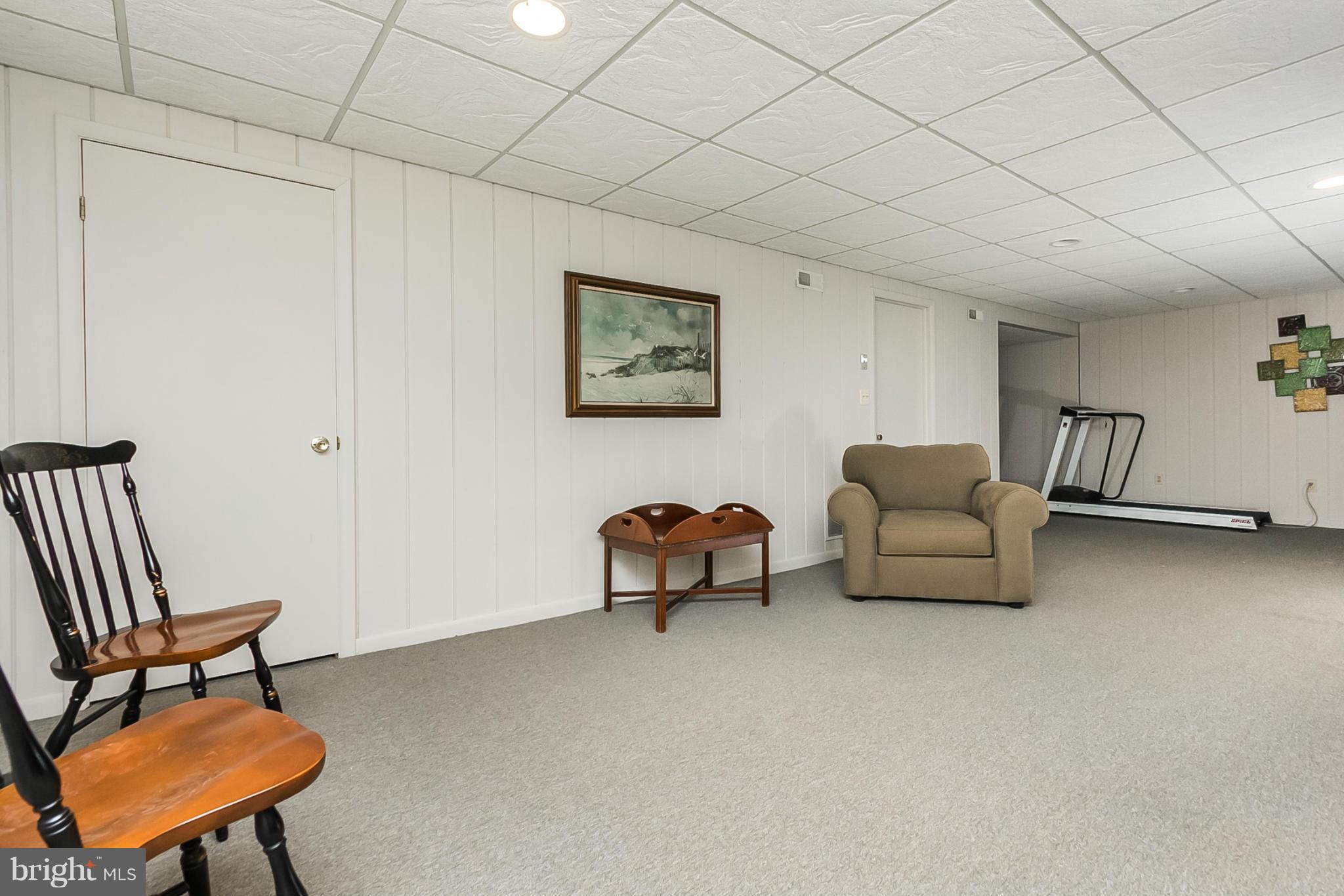 14106 Manor Road Phoenix, MD 21131 - Photo 24 of 30 a living room with furniture and a chair