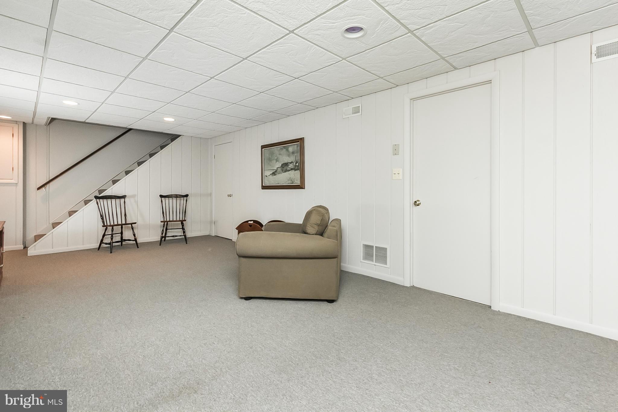 14106 Manor Road Phoenix, MD 21131 - Photo 25 of 30 a living room with furniture and a couch