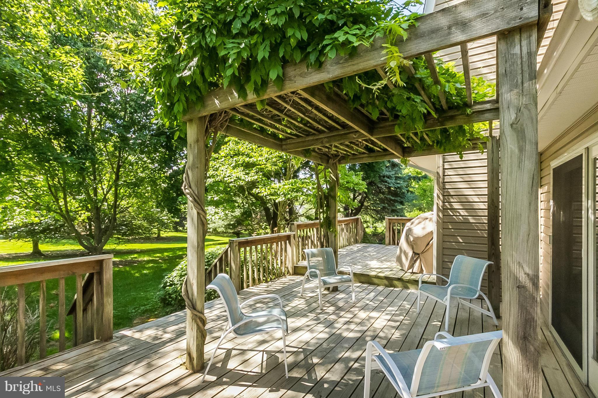 14106 Manor Road Phoenix, MD 21131 - Photo 26 of 30 a view of a patio with a table chairs and a patio