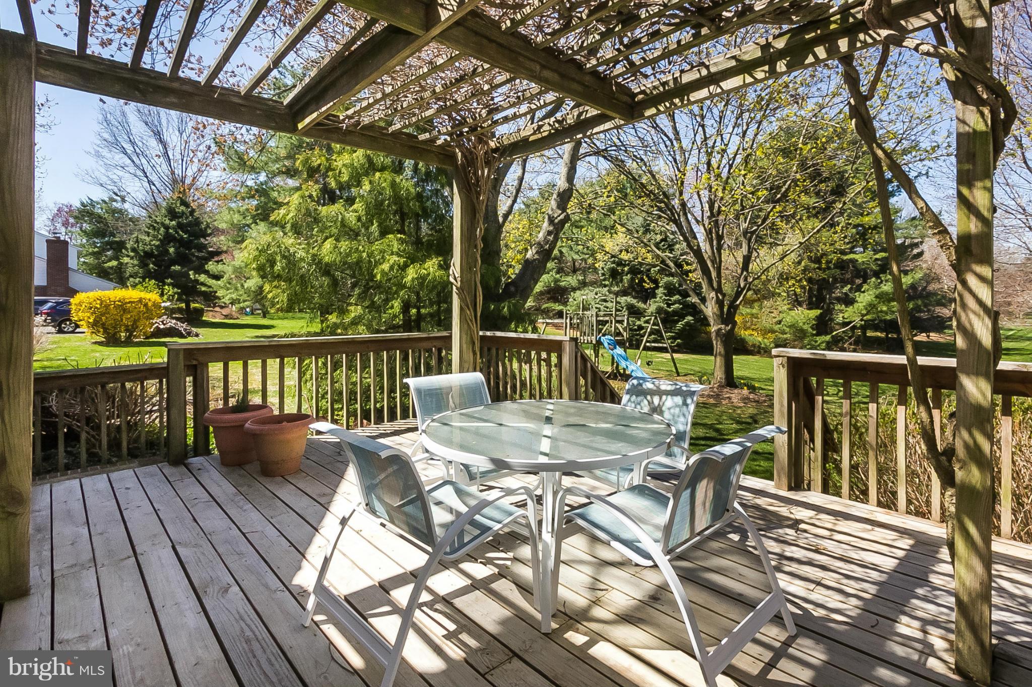 14106 Manor Road Phoenix, MD 21131 - Photo 28 of 30 a view of a patio with a table chairs and a patio