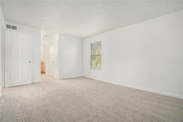 a bathroom with a sink a vanity and a bathtub